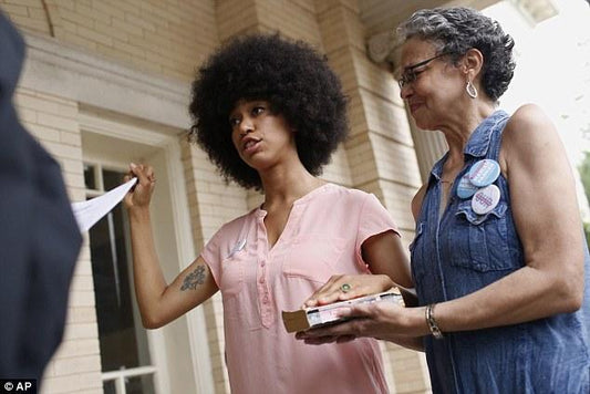 Newly Elected County Commissioner In Athens, Georgia Takes Oath Of Office On 'The Autobiography Of Malcolm X'