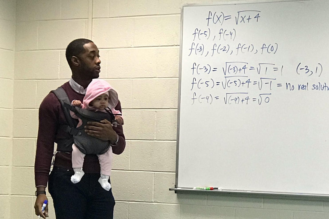 Morehouse Professor Holds Student's Baby During Class so Father Can Take Good Notes