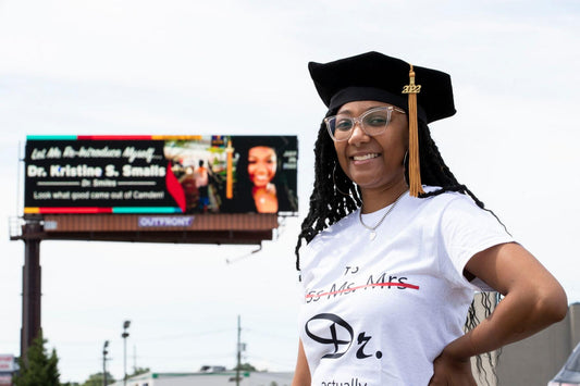 Mom Takes Out Billboard To Celebrate Daughter Earning Her Doctorate Degree