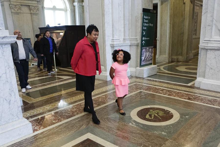 This 4-Year-Old Honorary Librarian Has to be the Cutest and Most Well Read Kid Ever