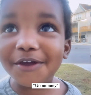 This Toddler Cheering His Mother On While Helping Her Record Is Absolutely Adorable