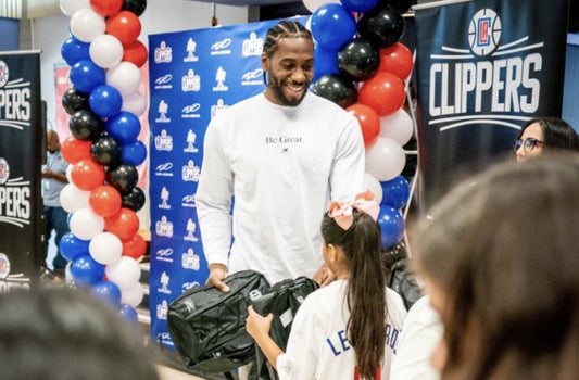 NBA Superstar Kawhi Leonard Gives Away 1 Million Bookbags to Students in Los Angeles