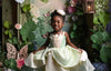 Little girl dressed as Princess Tiana