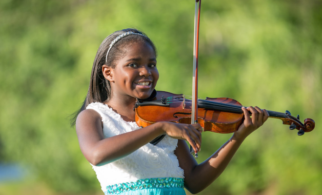 10-Year-Old Musical Prodigy Honors Aretha Franklin With A Violin Rendition Of ‘Natural Woman’