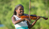 10-Year-Old Musical Prodigy Honors Aretha Franklin With A Violin Rendition Of ‘Natural Woman’