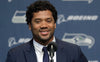 Teamwork Makes the Dream Work: Russell Wilson Gifts Offensive Linemen With Stock in Amazon